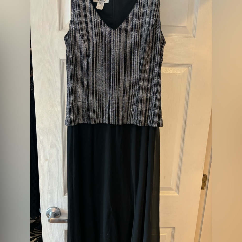 Long woman’s sparking evening dress